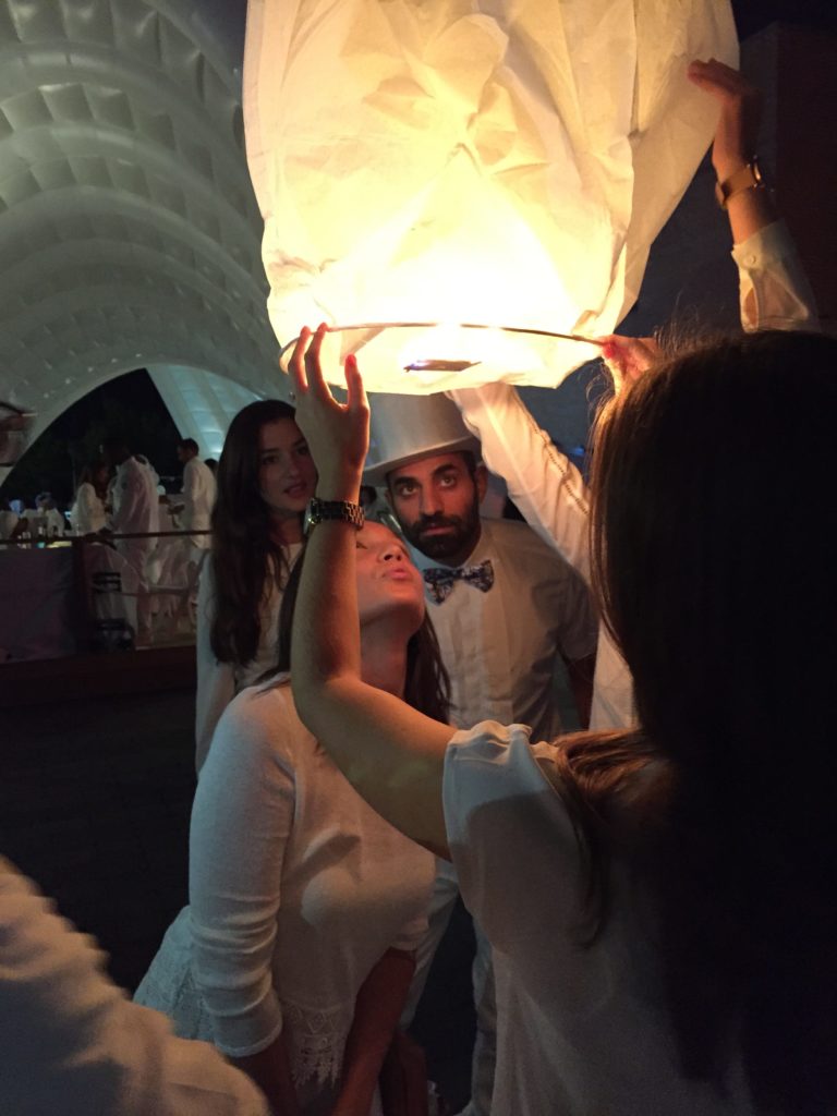 Lighting a paper lantern