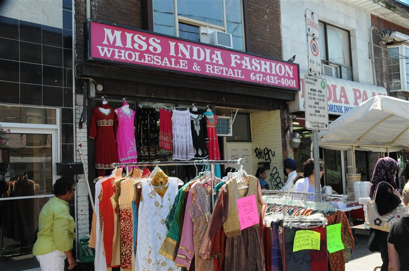 Indian clothing on racks outside a store at Festival of South Asia