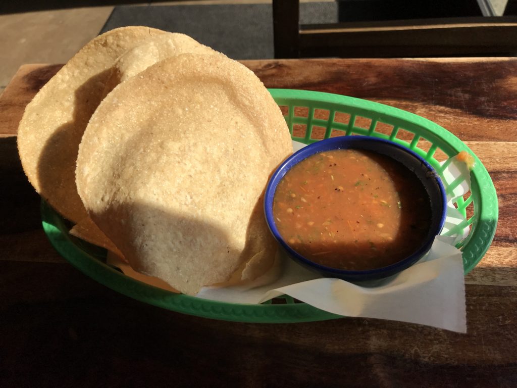 The round corn tortillas served as chips with salsa at Super Mex restaurant