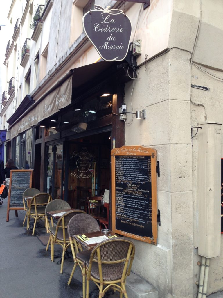 Crepe Restaurant exterior with menu at La Cidrerie du Marais in Paris