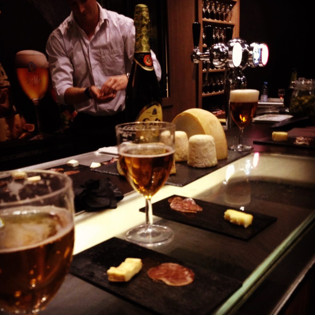 Leffe Royale Belgian Beer on a bar with charcuterie