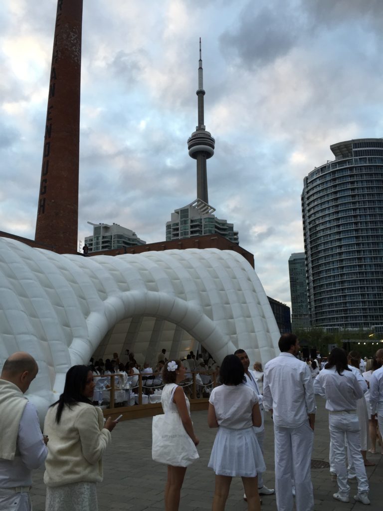 lines of people dressed in white 