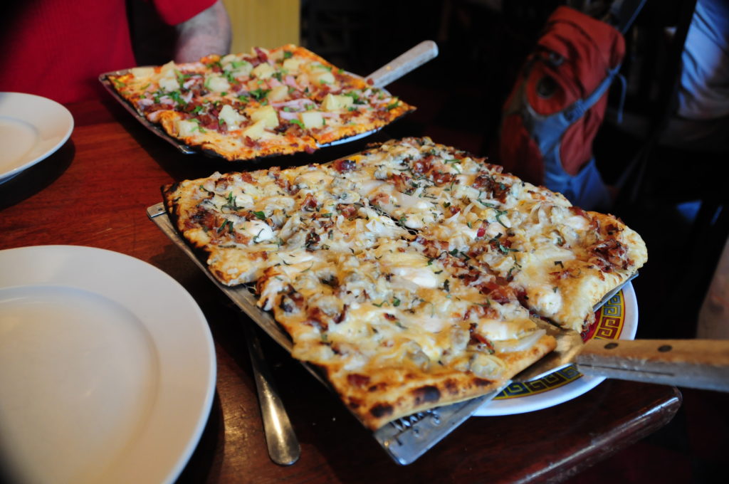 Two square pizzas on the table