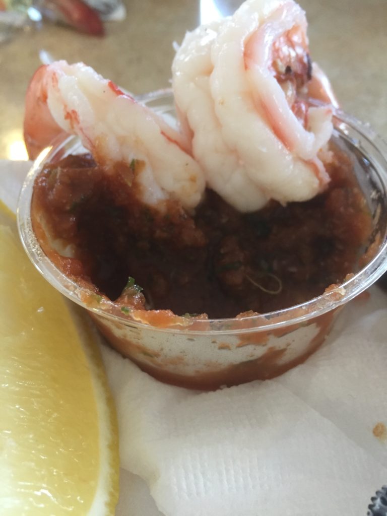 two shrimps in cocktail sauce at Point Loma Seafoods