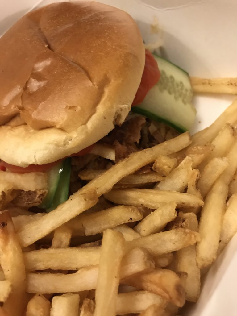 pulled pork sandwich with fries from Capt Cook's at the Polynesian Hotel