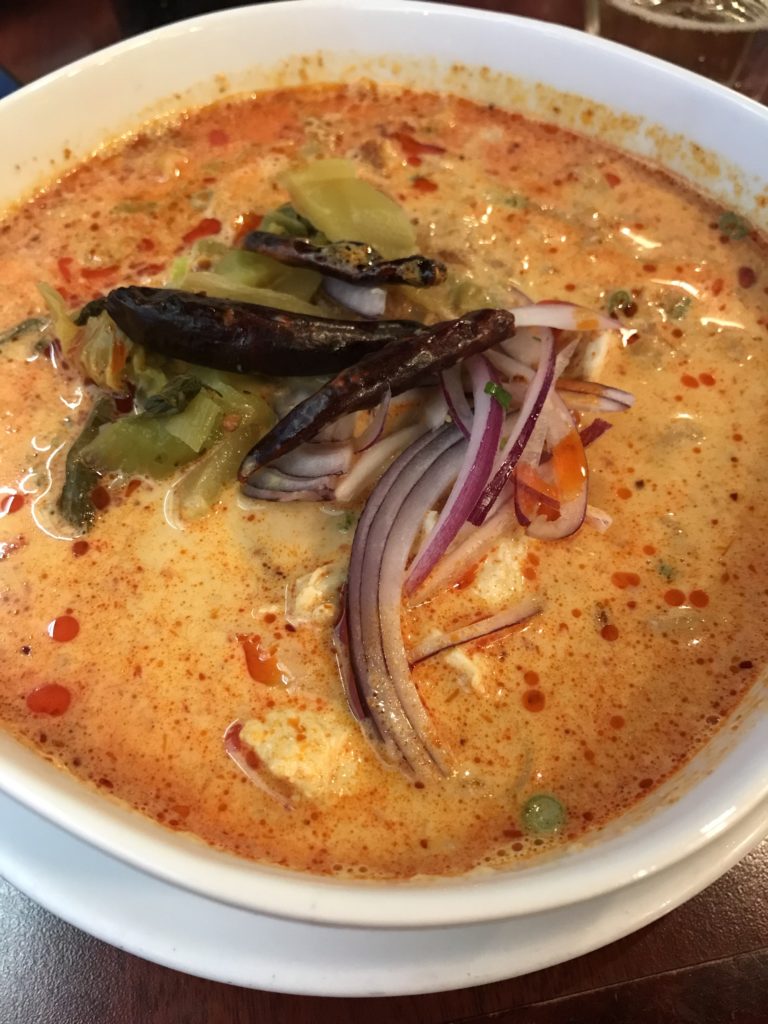 Khao Soi dish close-up at Moo Pa Thai in Long Beach
