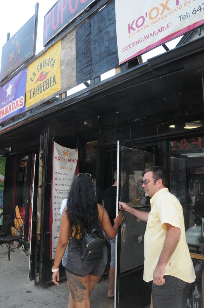 Entering the mixed building with many food establishments, where Pancho's is located.