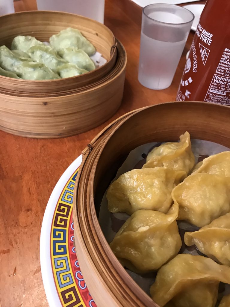 two Chinese steamers with different dumplings