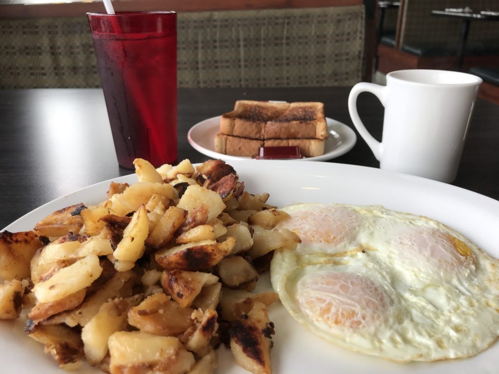 3 egg breakfast with toast and homefries, coffee and water