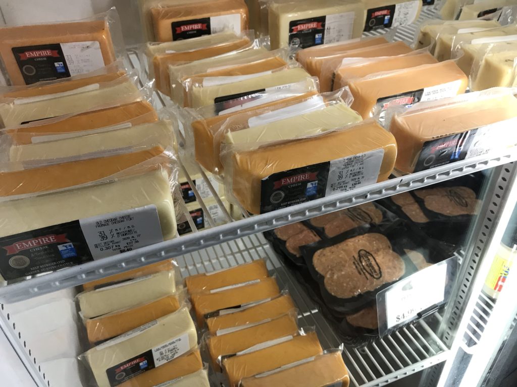 Local cheeses in a refrigerator at Herrington's butcher shop in Port Perry