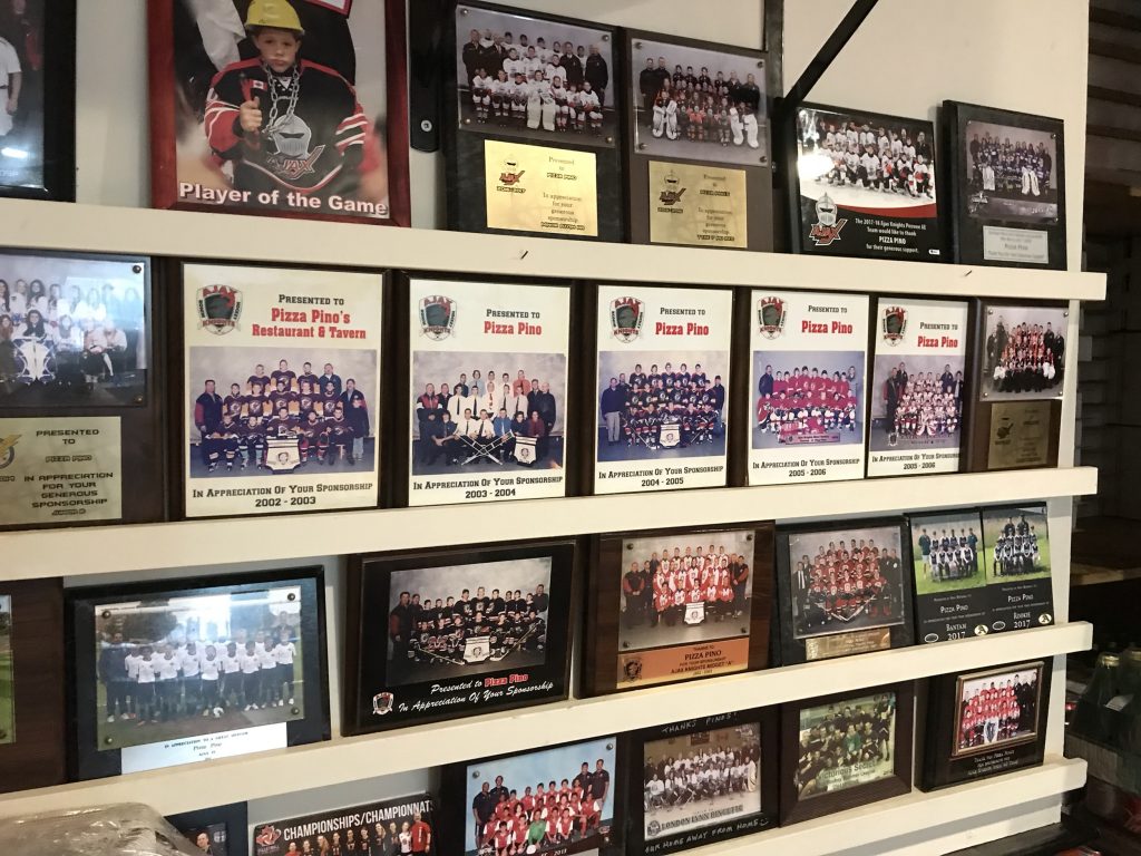 Team photos on the wall