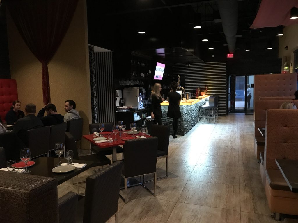 Interior Mazaar Lebanese Cuisine with booths and tables and bar